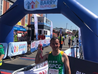 Mr Cairns at the finish line